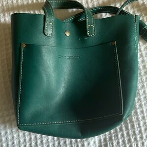 Portland leather mini crossbody in Peacock